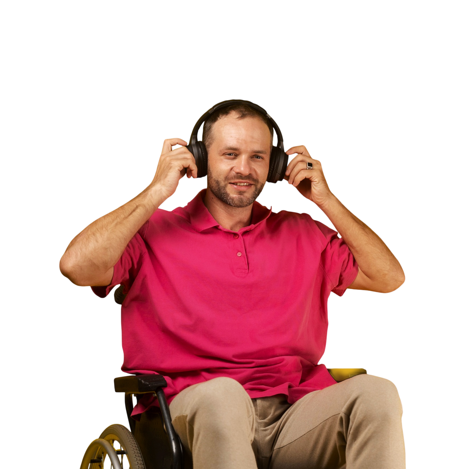 Person using headphones while seated in a wheelchair