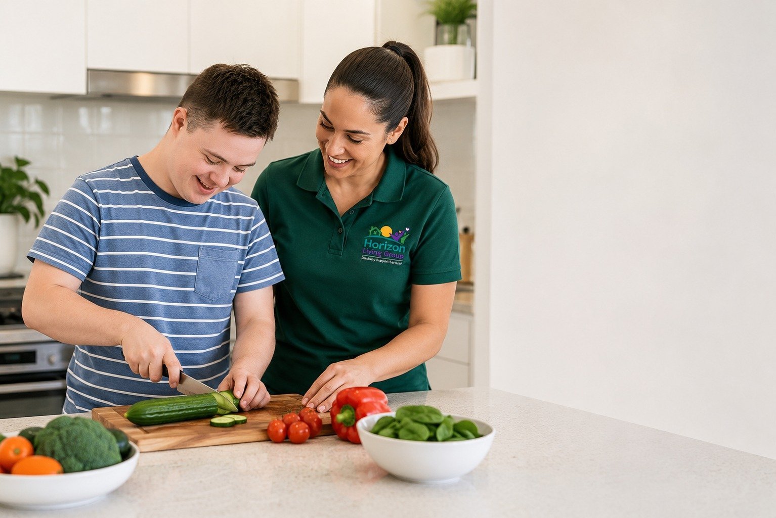 NDIS support worker assisting a participant with preparing vegetables in the kitchen